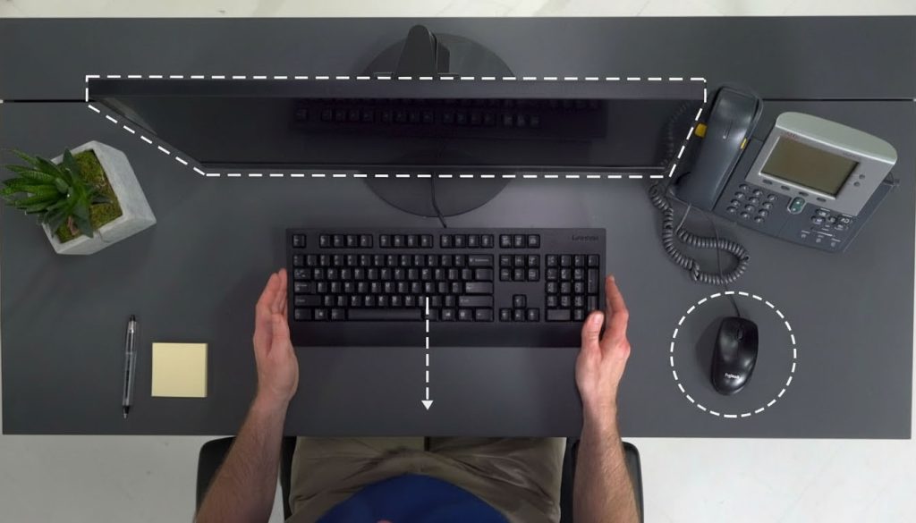 Clean and organized workspace optimized with ergonomic setup, lighting, and productivity tools