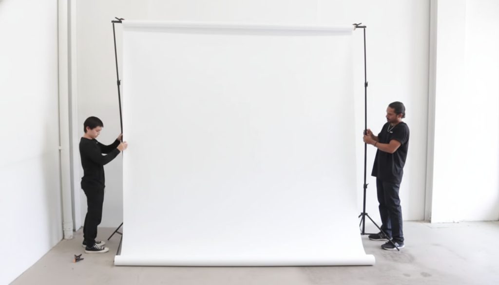 Product photography backdrop setup with clean background, proper lighting, and studio equipment