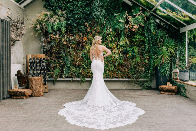 Experiment with angles and composition in wedding photography to create depth, balance, and visually striking images