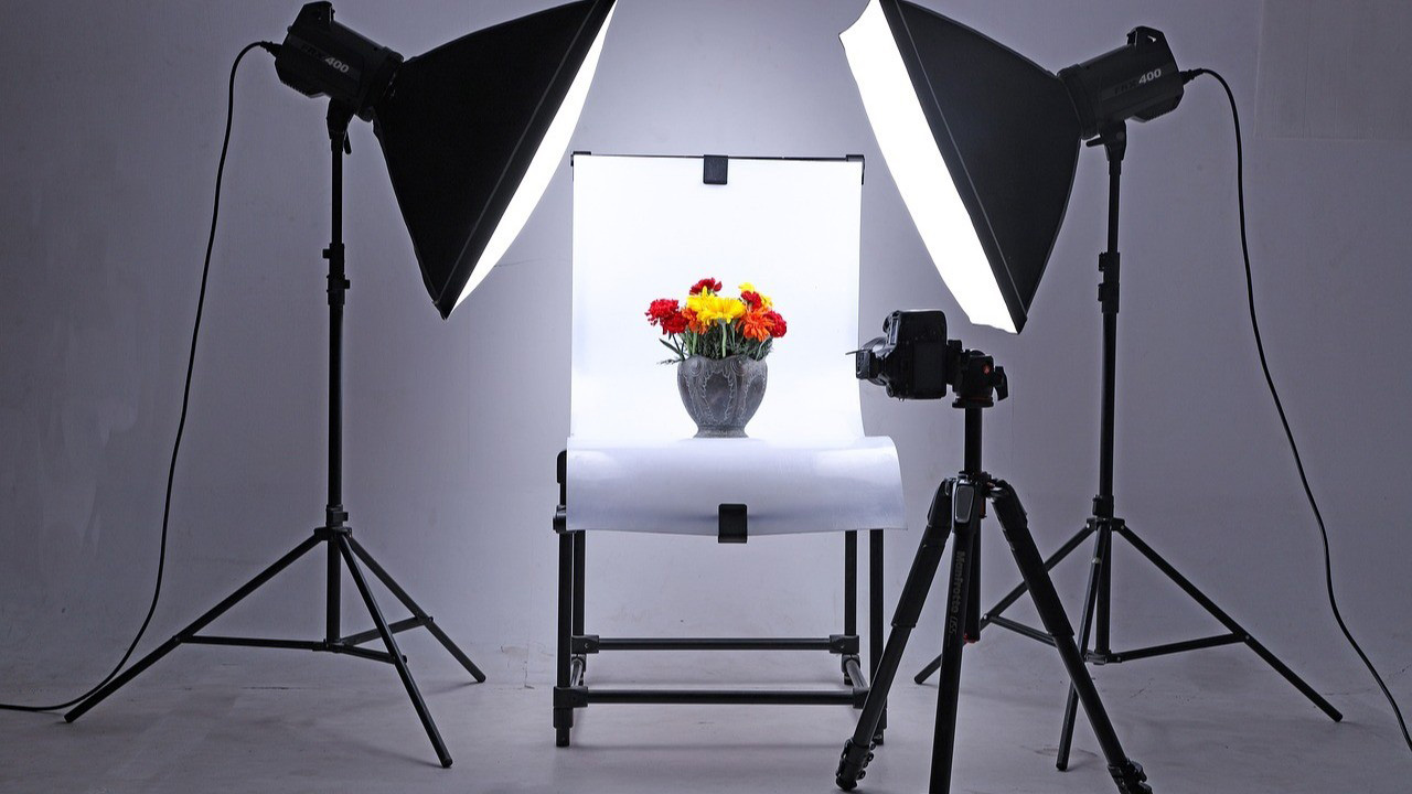 Ecommerce photography studio setup with lighting, backdrop, and camera for professional product images