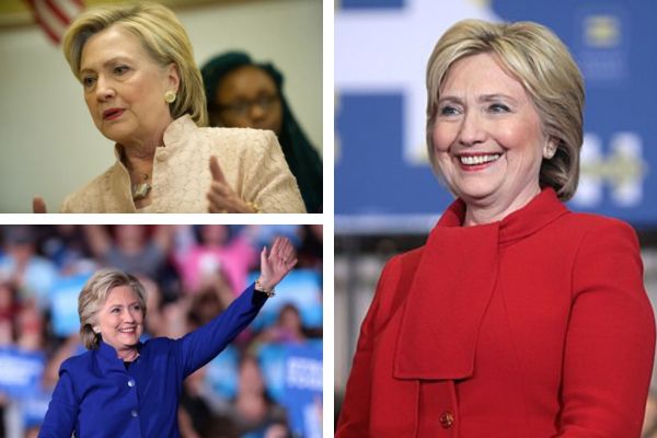 Hillary Clinton at a public political event with press coverage and media cameras capturing the moment